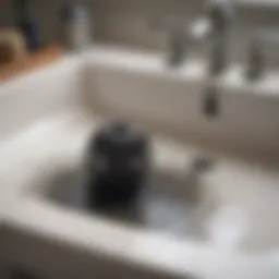 Close-up of hair clogging a bathroom sink drain