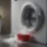 A close-up view of laundry detergent being poured into a washing machine