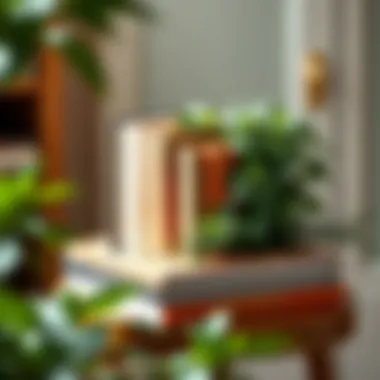 Creative arrangement of books and greenery on a compact table