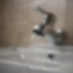 Close-up of hard water stains on a bathroom faucet