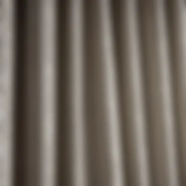 Close-up of textured fabric pattern on black and off-white curtains