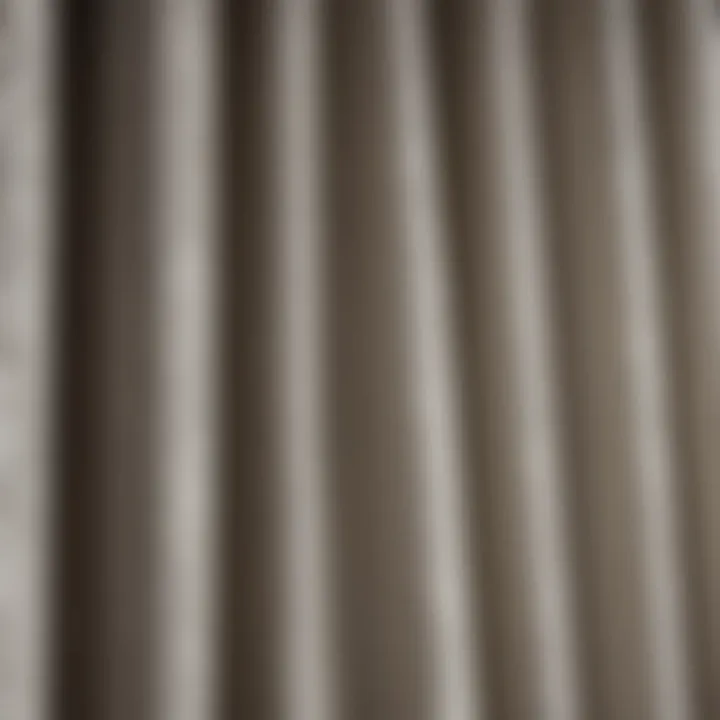 Close-up of textured fabric pattern on black and off-white curtains