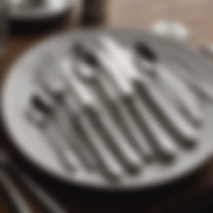 Close-up of polished silverware arranged precisely on a table