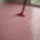 Close-up view of The Pink Stuff grout cleaner showcasing its creamy texture