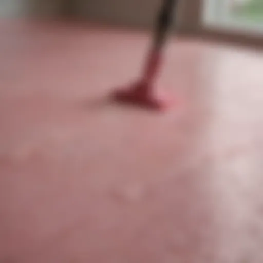 Close-up view of The Pink Stuff grout cleaner showcasing its creamy texture
