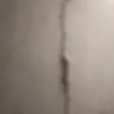 Vertical crack in a plastered wall