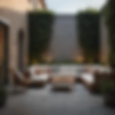 Modern Elegance in Walled Patio Design Elegant walled patio showcasing modern furniture and greenery